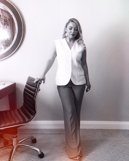 Photoshoot woman hand on chair posing