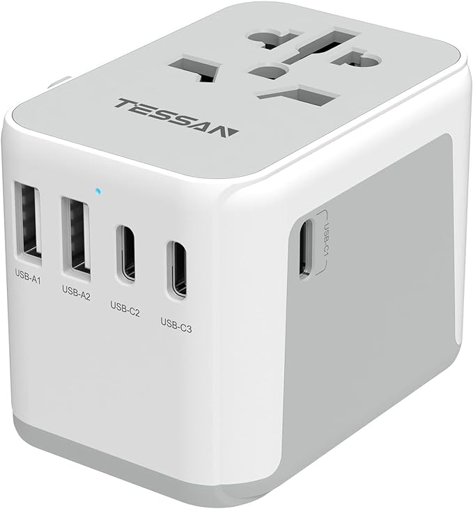 Universal Adapter From Amazon For Charging Phones, Cameras and Laptops